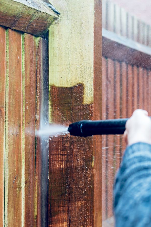 Cleaning Of Wood Fence With Pressure Washer