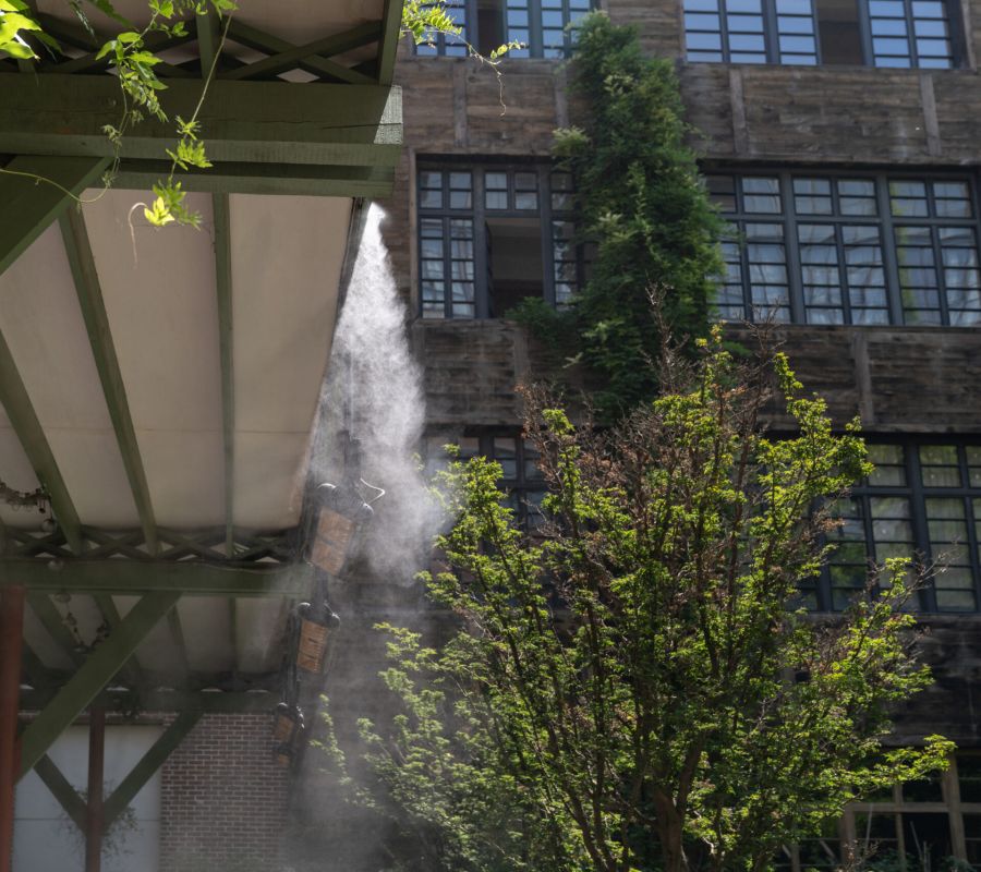 pressure washing the roof of a commercial building